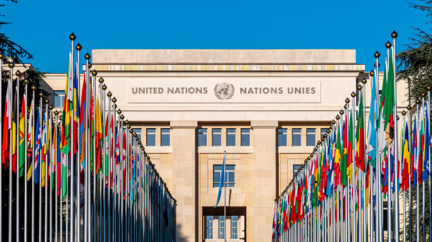 The United Nations building in Geneva with rows of member-state flags